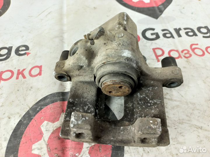 Суппорт задний правый Ford Focus 2 Mazda 3bk Форд