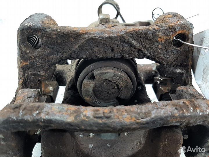 Суппорт задний правый Opel Combo 3 (C) рест. 2004