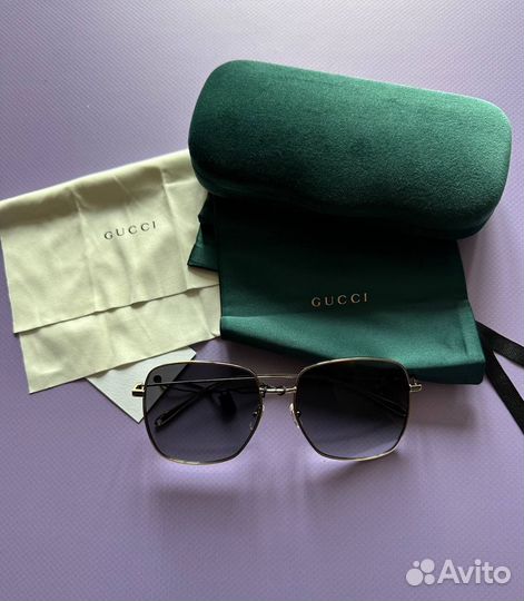 Солнцезащитные очки Gucci