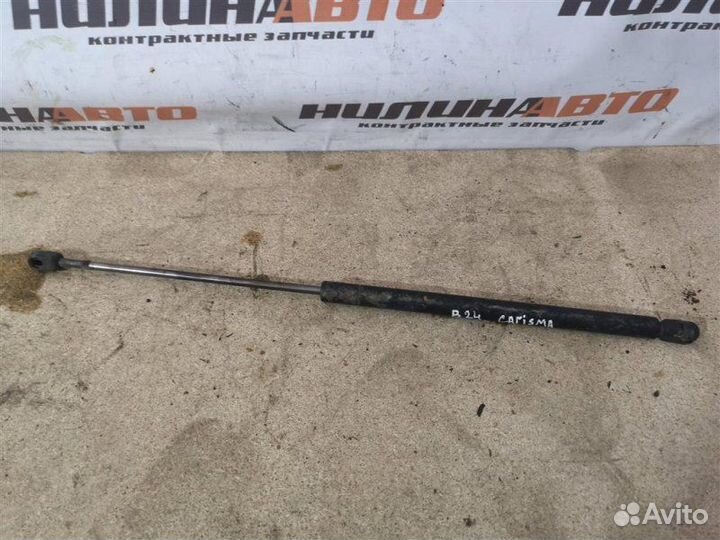 Амортизатор крышки багажника Mitsubishi Carisma