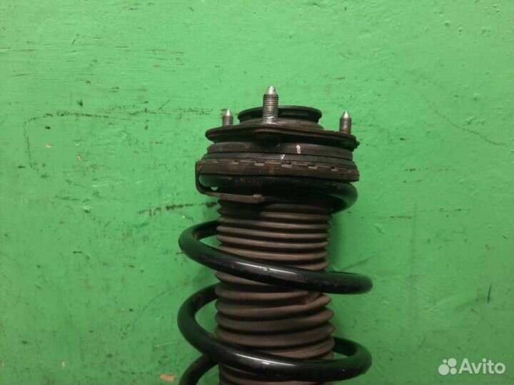 Стойка амортизатора передняя левая Honda Civic 4D