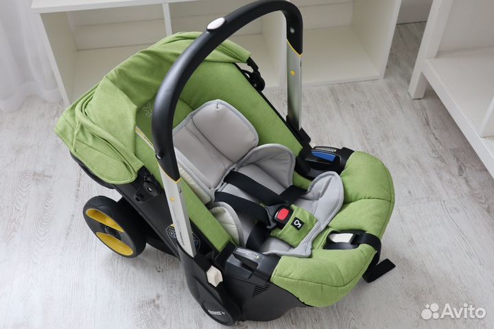 Коляска-автокресло Doona с базой isofix