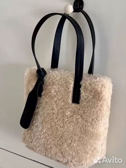 Плюшевая сумочка на замочке