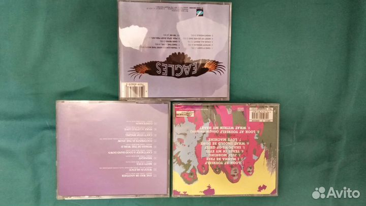 Компакт диски Eagles и Uriah Heep