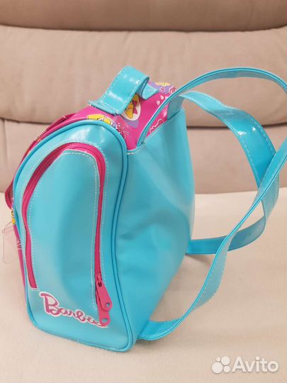 Щенок Барби в рюкзаке