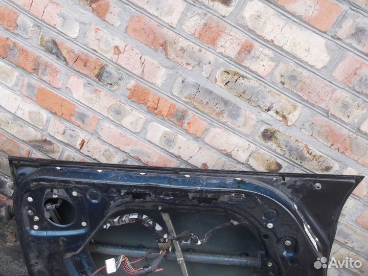 Дверь передняя левая Toyota Carina E