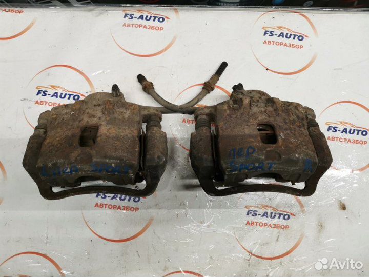 Суппорт тормозной передний Kia Sportage 2 2.0 G4GC