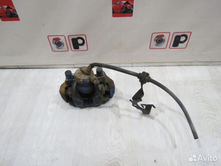 Суппорт тормозной передний левый Renault Sandero 2