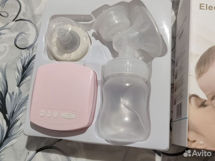 Молокоотсос электрический новый