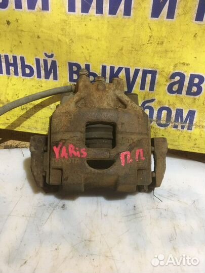 Суппорт тормозной передний правый Toyota Yaris