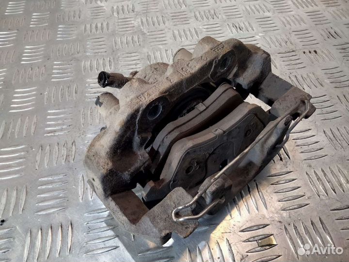 Суппорт левый Опель Вектра б