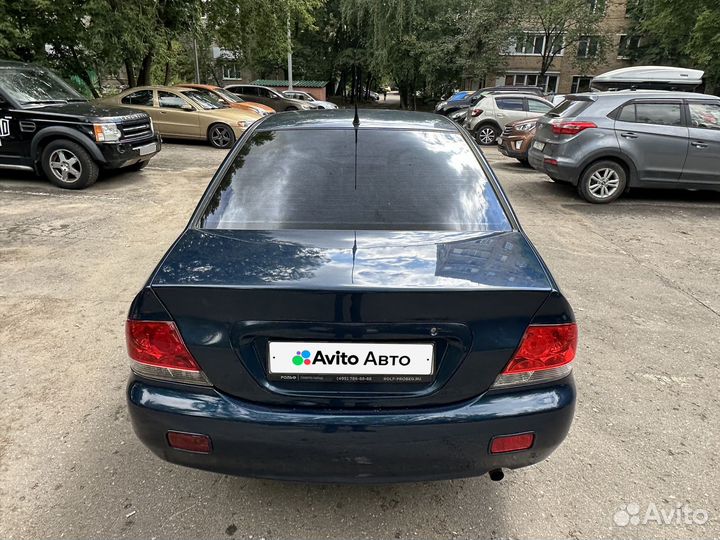 Mitsubishi Lancer 1.6 AT, 2005, 269 500 км