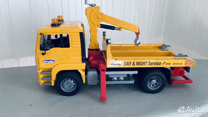 Грузовик с лебедкой Машинка Bruder CAT