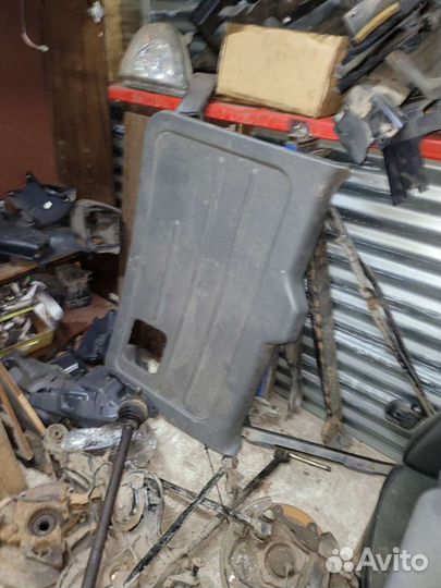 Обшивка карта двери на чери тиго 2010г