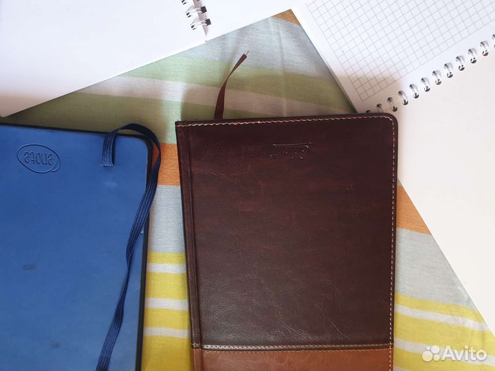 Ежедневники и блокноты