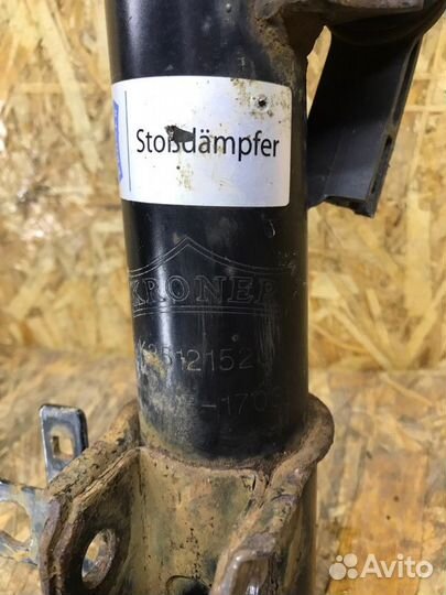 Стойка подвески передняя левая Opel Astra H