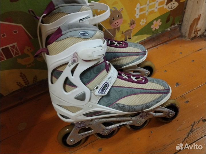 Роликовые коньки