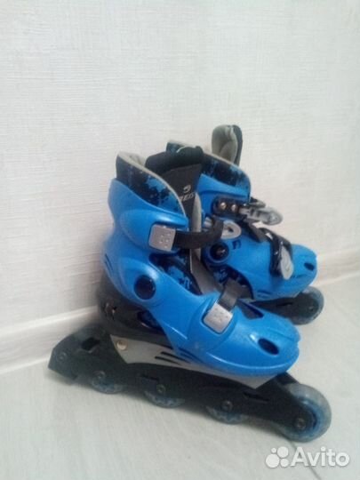 Роликовые коньки