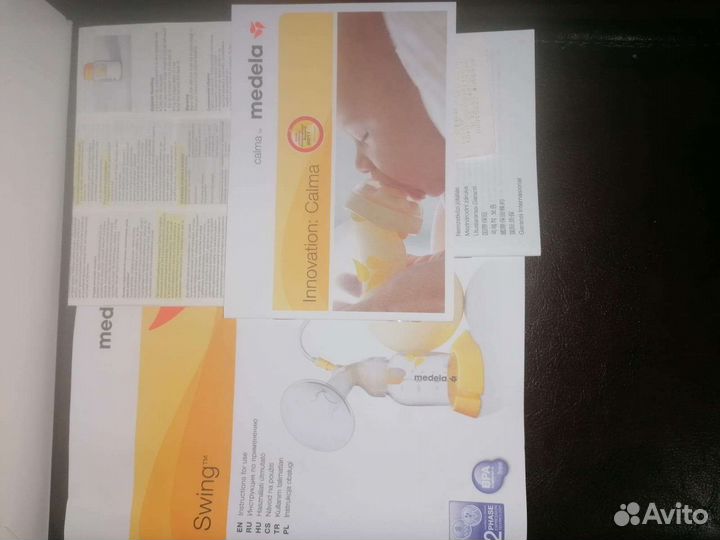 Молокоотсос medela электрический