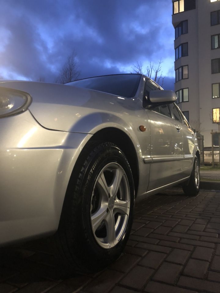 Mazda 323: фото владельца