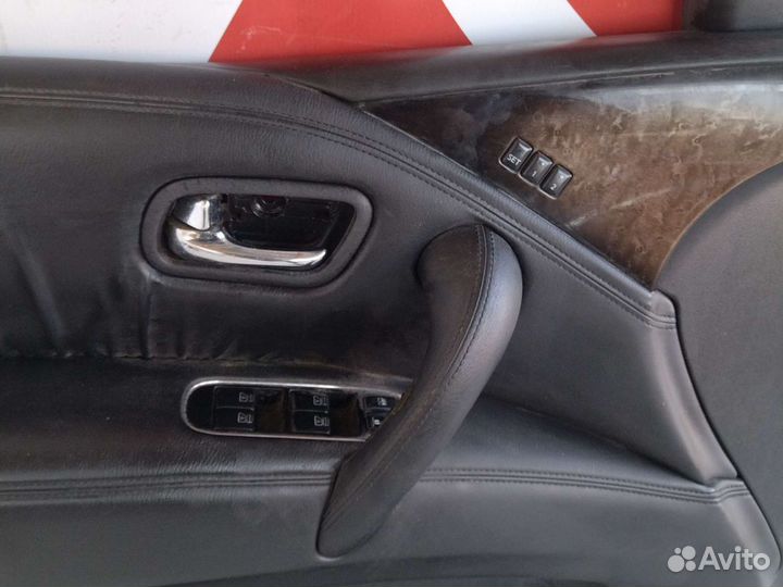 Обшивка двери передней левой Nissan Patrol Y62