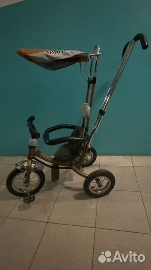 Трехколесный велосипед с ручкой