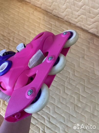 Роликовые коньки