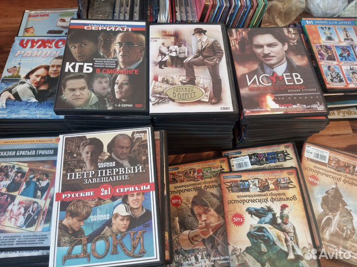 DVD диски с фильмами и мультфильмами пакетом