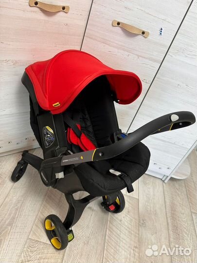 Коляска автокресло doona с базой isofix