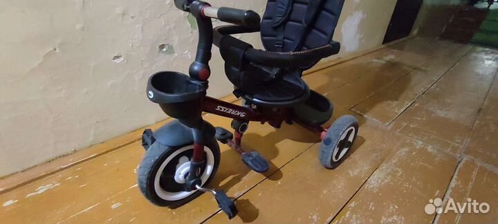 Велосипед-коляска с ручкой