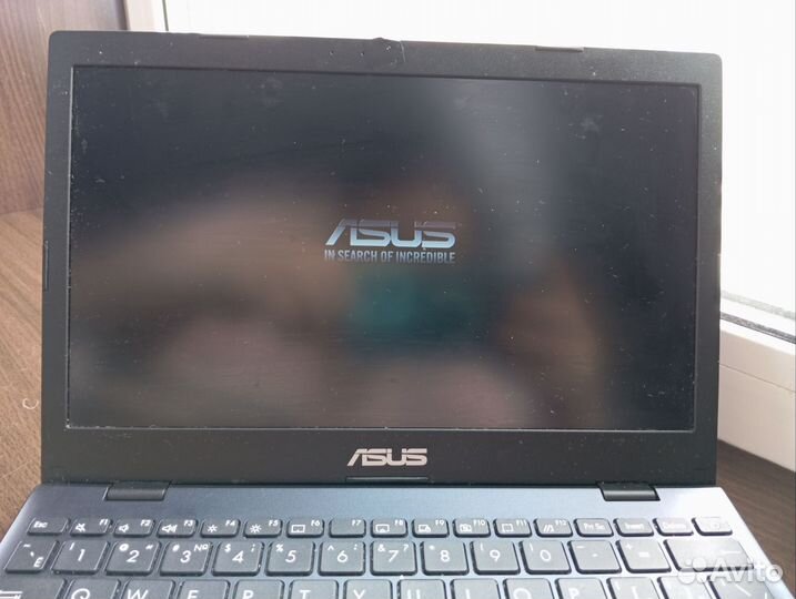 Ноутбук asus laptop e210м