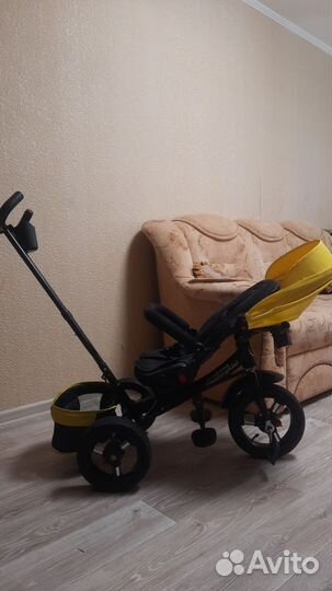 Велосипед трехколесный с поворотным сидением