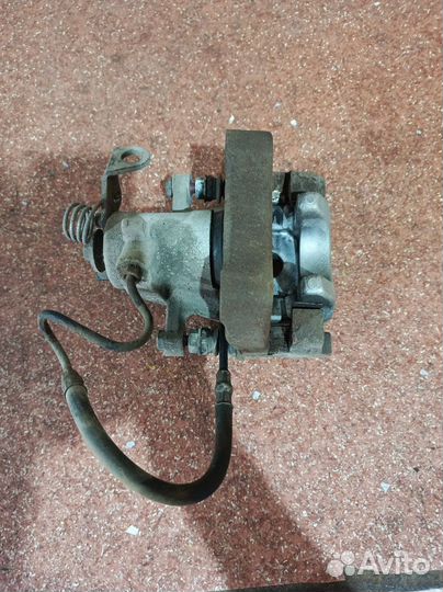 Суппорт тормозной задний Peugeot 308