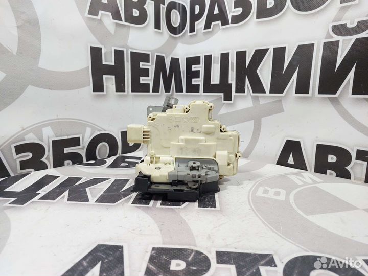 Замок двери задний левый Volkswagen Passat B6