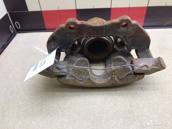 Суппорт передний правый Мазда 3 вк