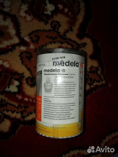 Молокоотсос ручной и соска на бутылку от молокоотс