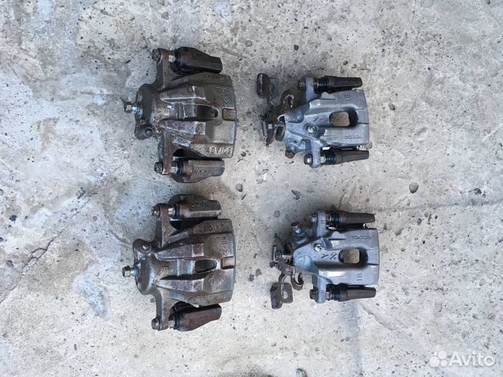 Суппорт corolla 150 передние - задние комплект