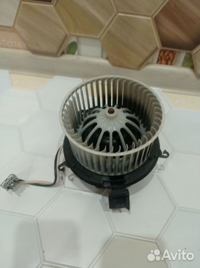 Моторчик печки Opel Astra