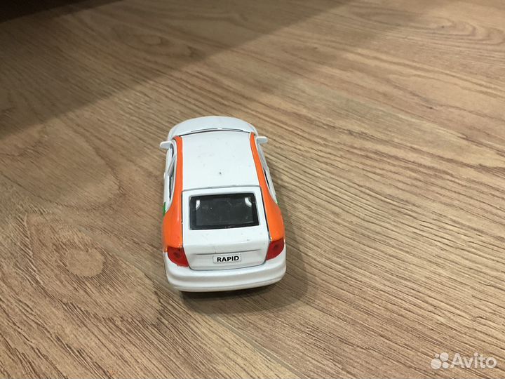 Автомобиль каршеринг Skoda Rapid игрушка