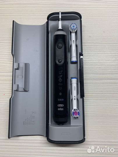 Электрическая зубная щетка oral b