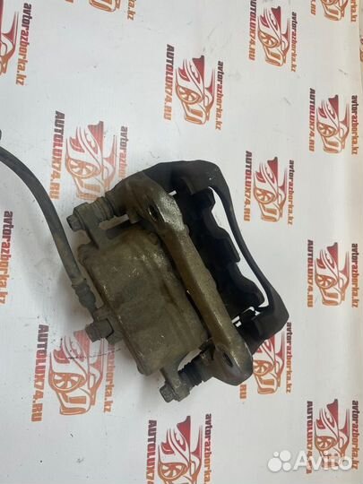 Суппорт тормозной передний правый Honda Cr-V 4 RE5