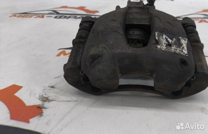 Суппорт тормозной передний левый Peugeot 308