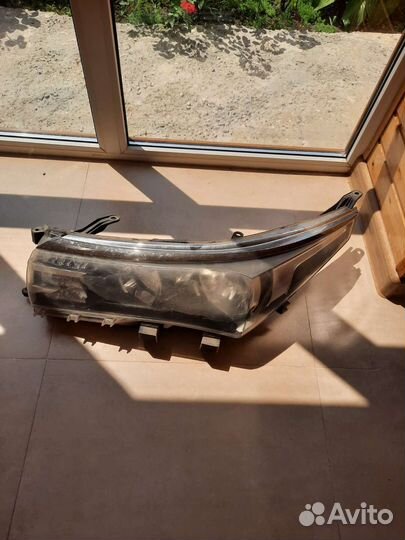 Левая фара corolla 150