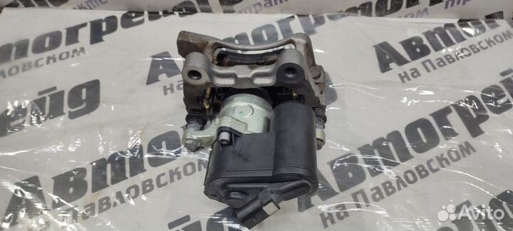 Суппорт тормозной задний левый Volkswagen Passat