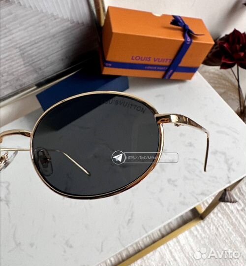 Солнцезащитные очки Louis Vuitton женские