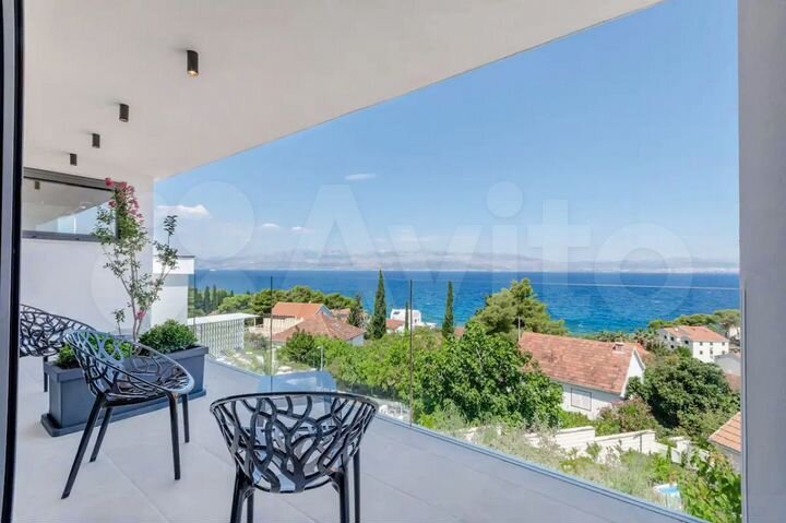 Коттедж 318,6 м² на участке 9 сот.