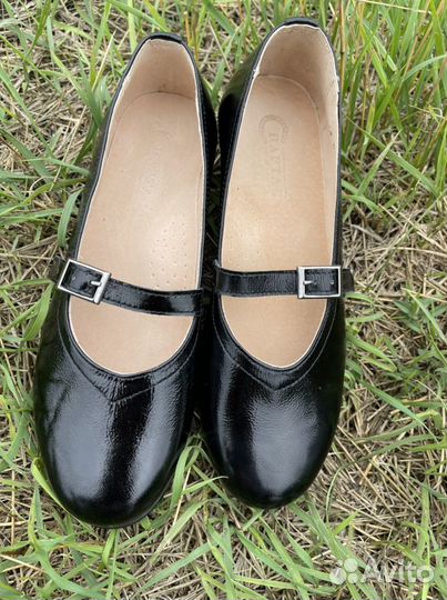 Новые кожаные туфли