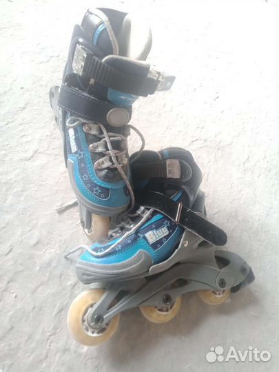 Роликовые коньки