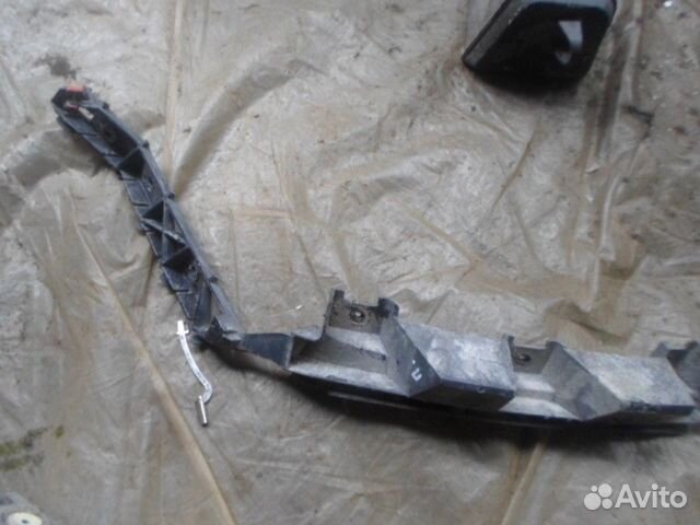 Кронштейн заднего бампера правый Opel Astra H 2004