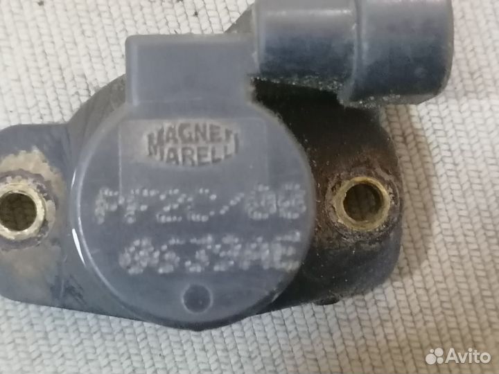 Датчик положен.дроссельн.заслонки Peugeot 206 1.4